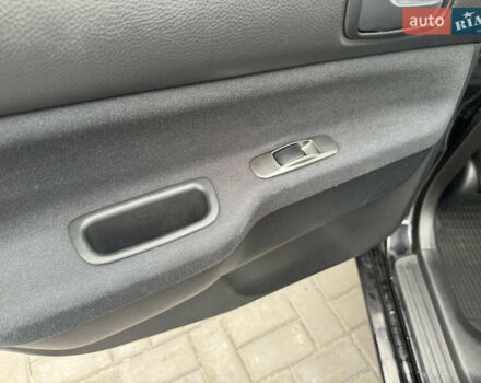 Чорний Міцубісі Lancer, об'ємом двигуна 1.58 л та пробігом 128 тис. км за 5999 $, фото 23 на Automoto.ua