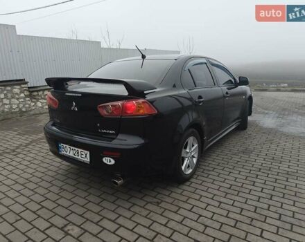 Черный Мицубиси Лансер, объемом двигателя 2 л и пробегом 228 тыс. км за 7000 $, фото 2 на Automoto.ua