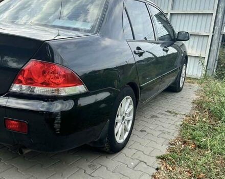 Чорний Міцубісі Lancer, об'ємом двигуна 1.6 л та пробігом 220 тис. км за 3000 $, фото 2 на Automoto.ua