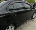 Чорний Міцубісі Lancer, об'ємом двигуна 2 л та пробігом 234 тис. км за 6199 $, фото 15 на Automoto.ua