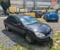 Чорний Міцубісі Lancer, об'ємом двигуна 1.58 л та пробігом 248 тис. км за 3800 $, фото 1 на Automoto.ua