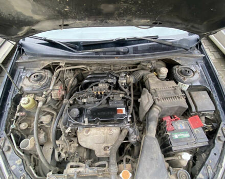 Чорний Міцубісі Lancer, об'ємом двигуна 1.58 л та пробігом 287 тис. км за 4750 $, фото 15 на Automoto.ua