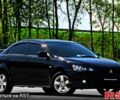 Чорний Міцубісі Lancer, об'ємом двигуна 2 л та пробігом 132 тис. км за 7300 $, фото 1 на Automoto.ua