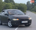 Чорний Міцубісі Lancer, об'ємом двигуна 2 л та пробігом 200 тис. км за 4700 $, фото 1 на Automoto.ua