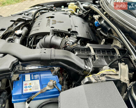 Черный Мицубиси Лансер, объемом двигателя 2 л и пробегом 221 тыс. км за 6750 $, фото 29 на Automoto.ua