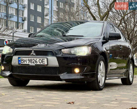 Черный Мицубиси Лансер, объемом двигателя 2 л и пробегом 221 тыс. км за 6750 $, фото 2 на Automoto.ua