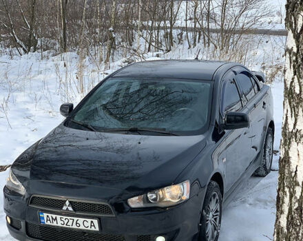 Чорний Міцубісі Lancer, об'ємом двигуна 2 л та пробігом 200 тис. км за 7200 $, фото 9 на Automoto.ua