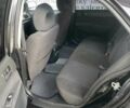 Чорний Міцубісі Lancer, об'ємом двигуна 1.59 л та пробігом 309 тис. км за 3900 $, фото 4 на Automoto.ua