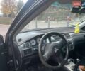 Чорний Міцубісі Lancer, об'ємом двигуна 1.6 л та пробігом 220 тис. км за 3000 $, фото 1 на Automoto.ua