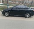 Черный Мицубиси Лансер, объемом двигателя 2 л и пробегом 141 тыс. км за 7200 $, фото 1 на Automoto.ua