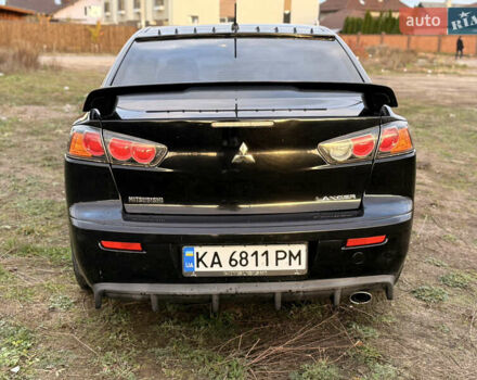 Чорний Міцубісі Lancer, об'ємом двигуна 2 л та пробігом 204 тис. км за 7500 $, фото 5 на Automoto.ua