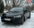 Черный Мицубиси Лансер, объемом двигателя 1.5 л и пробегом 247 тыс. км за 6900 $, фото 1 на Automoto.ua