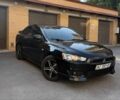 Чорний Міцубісі Lancer, об'ємом двигуна 2 л та пробігом 209 тис. км за 7600 $, фото 1 на Automoto.ua