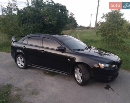 Чорний Міцубісі Lancer, об'ємом двигуна 2 л та пробігом 180 тис. км за 6999 $, фото 4 на Automoto.ua