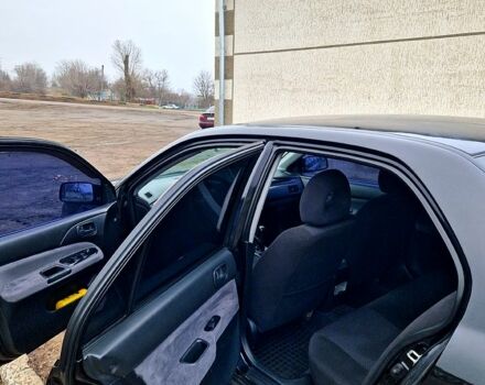 Чорний Міцубісі Lancer, об'ємом двигуна 1.6 л та пробігом 300 тис. км за 3500 $, фото 9 на Automoto.ua