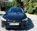 Чорний Міцубісі Lancer, об'ємом двигуна 2 л та пробігом 205 тис. км за 7000 $, фото 1 на Automoto.ua