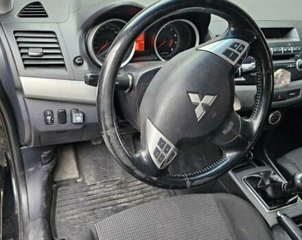 Чорний Міцубісі Lancer, об'ємом двигуна 2 л та пробігом 214 тис. км за 5900 $, фото 2 на Automoto.ua