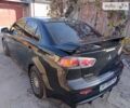 Чорний Міцубісі Lancer, об'ємом двигуна 2 л та пробігом 178 тис. км за 7700 $, фото 1 на Automoto.ua