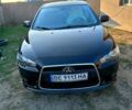 Чорний Міцубісі Lancer, об'ємом двигуна 2 л та пробігом 170 тис. км за 7200 $, фото 2 на Automoto.ua