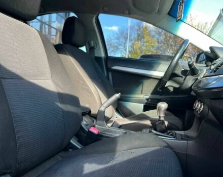 Черный Мицубиси Лансер, объемом двигателя 2 л и пробегом 215 тыс. км за 7000 $, фото 16 на Automoto.ua