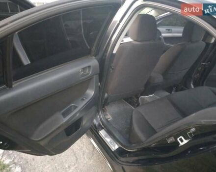 Чорний Міцубісі Lancer, об'ємом двигуна 2 л та пробігом 180 тис. км за 6999 $, фото 5 на Automoto.ua