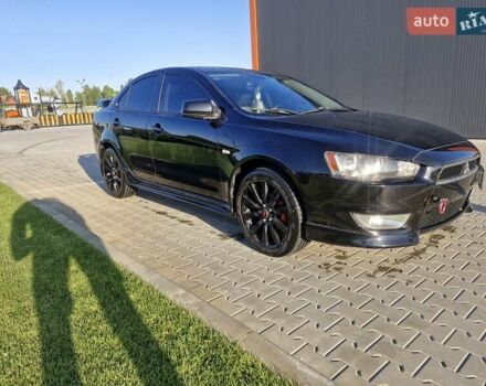 Черный Мицубиси Лансер, объемом двигателя 2 л и пробегом 184 тыс. км за 6999 $, фото 6 на Automoto.ua