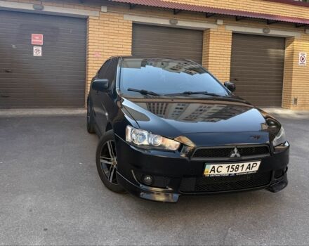 Чорний Міцубісі Lancer, об'ємом двигуна 2 л та пробігом 209 тис. км за 7600 $, фото 1 на Automoto.ua