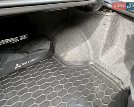 Черный Мицубиси Лансер, объемом двигателя 1.58 л и пробегом 78 тыс. км за 6500 $, фото 18 на Automoto.ua