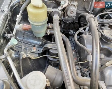 Черный Мицубиси Лансер, объемом двигателя 1.58 л и пробегом 78 тыс. км за 6500 $, фото 11 на Automoto.ua