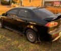 Чорний Міцубісі Lancer, об'ємом двигуна 2 л та пробігом 204 тис. км за 7500 $, фото 3 на Automoto.ua