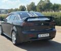 Чорний Міцубісі Lancer, об'ємом двигуна 2 л та пробігом 216 тис. км за 6950 $, фото 5 на Automoto.ua