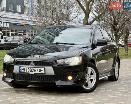 Черный Мицубиси Лансер, объемом двигателя 2 л и пробегом 221 тыс. км за 6750 $, фото 4 на Automoto.ua