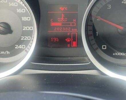 Черный Мицубиси Лансер, объемом двигателя 2 л и пробегом 201 тыс. км за 7000 $, фото 5 на Automoto.ua