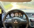 Чорний Міцубісі Lancer, об'ємом двигуна 1.6 л та пробігом 98 тис. км за 5600 $, фото 26 на Automoto.ua