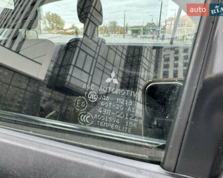 Чорний Міцубісі Lancer, об'ємом двигуна 1.58 л та пробігом 128 тис. км за 5999 $, фото 29 на Automoto.ua