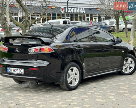 Черный Мицубиси Лансер, объемом двигателя 2 л и пробегом 221 тыс. км за 6750 $, фото 19 на Automoto.ua