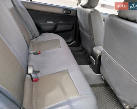 Черный Мицубиси Лансер, объемом двигателя 1.58 л и пробегом 78 тыс. км за 6500 $, фото 21 на Automoto.ua