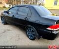 Чорний Міцубісі Lancer, об'ємом двигуна 1.6 л та пробігом 165 тис. км за 5000 $, фото 6 на Automoto.ua