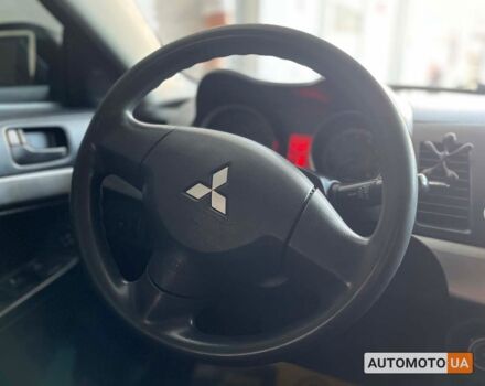 Черный Мицубиси Лансер, объемом двигателя 1.5 л и пробегом 245 тыс. км за 5100 $, фото 14 на Automoto.ua
