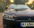 Чорний Міцубісі Lancer, об'ємом двигуна 2 л та пробігом 300 тис. км за 6400 $, фото 1 на Automoto.ua