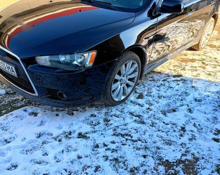 Чорний Міцубісі Lancer, об'ємом двигуна 2 л та пробігом 170 тис. км за 7200 $, фото 5 на Automoto.ua