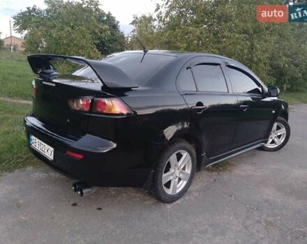 Чорний Міцубісі Lancer, об'ємом двигуна 2 л та пробігом 180 тис. км за 6999 $, фото 9 на Automoto.ua