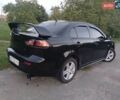 Чорний Міцубісі Lancer, об'ємом двигуна 2 л та пробігом 180 тис. км за 6999 $, фото 9 на Automoto.ua