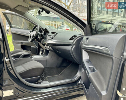 Черный Мицубиси Лансер, объемом двигателя 2 л и пробегом 221 тыс. км за 6750 $, фото 33 на Automoto.ua