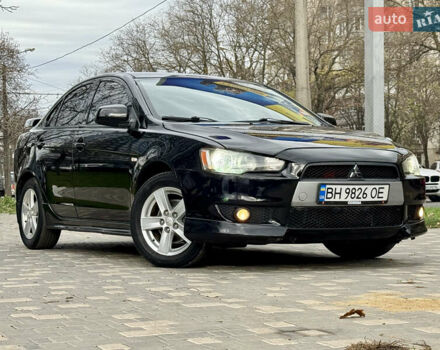 Черный Мицубиси Лансер, объемом двигателя 2 л и пробегом 221 тыс. км за 6750 $, фото 9 на Automoto.ua