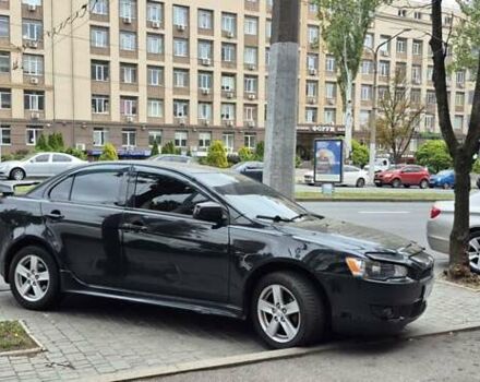 Чорний Міцубісі Lancer, об'ємом двигуна 2 л та пробігом 230 тис. км за 6800 $, фото 1 на Automoto.ua