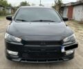 Чорний Міцубісі Lancer, об'ємом двигуна 2 л та пробігом 203 тис. км за 6976 $, фото 1 на Automoto.ua