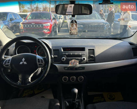 Черный Мицубиси Лансер, объемом двигателя 2 л и пробегом 215 тыс. км за 7000 $, фото 13 на Automoto.ua