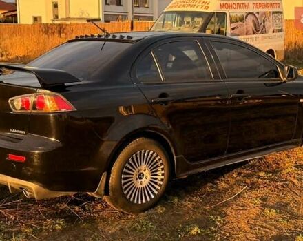 Чорний Міцубісі Lancer, об'ємом двигуна 2 л та пробігом 204 тис. км за 7500 $, фото 2 на Automoto.ua