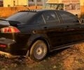 Чорний Міцубісі Lancer, об'ємом двигуна 2 л та пробігом 204 тис. км за 7500 $, фото 2 на Automoto.ua